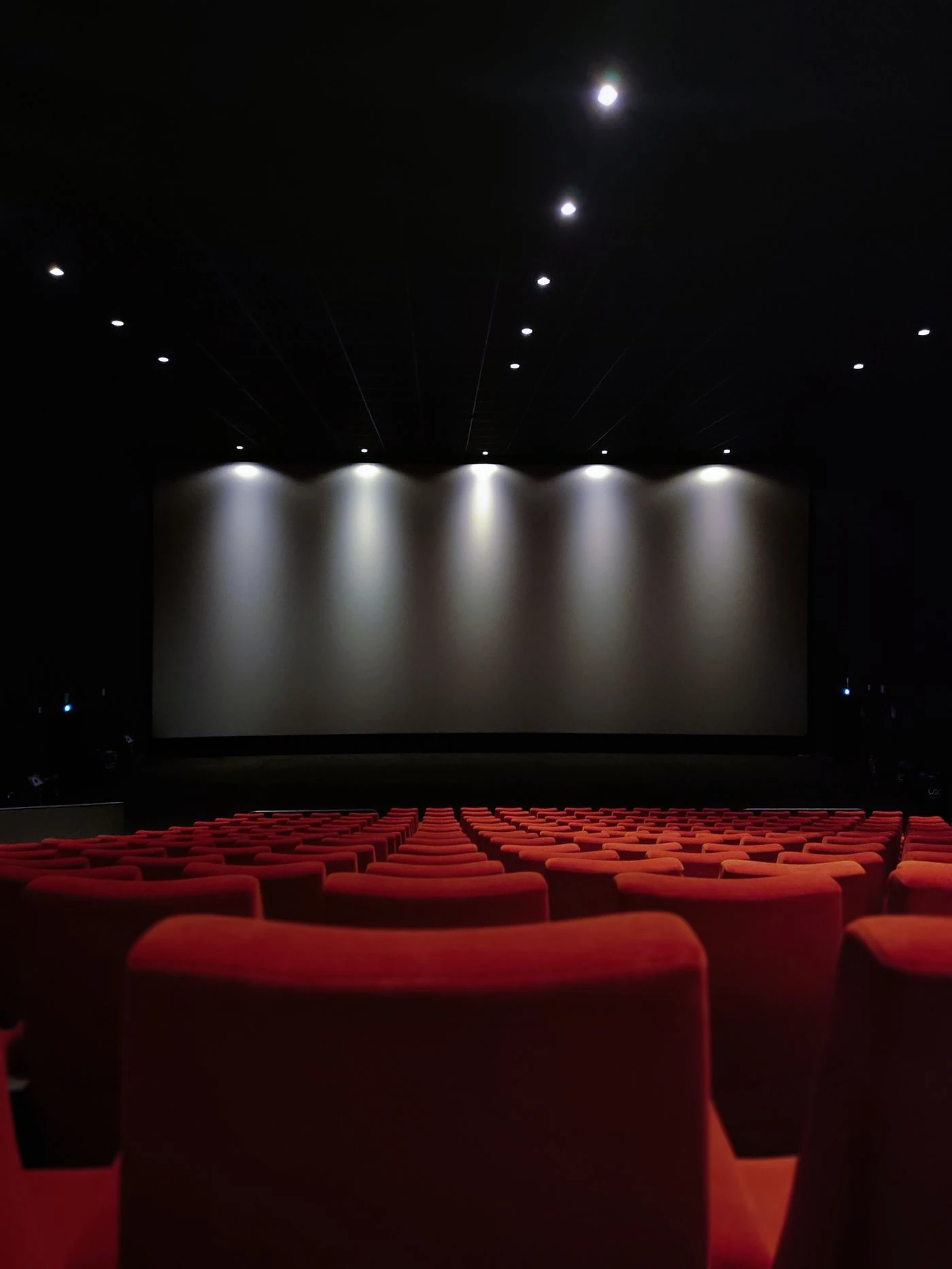 Empty cinema auditorium — thematic stock photo, not a scene from the series